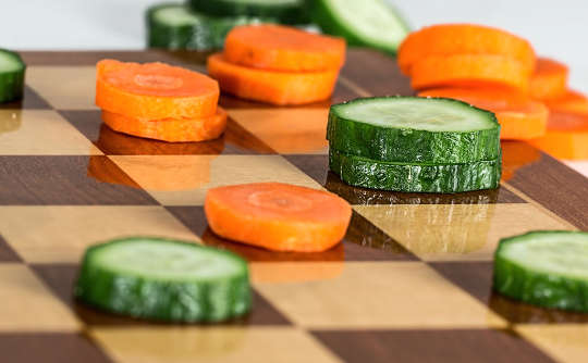 How to Safeguard Your Heart Health with Nutrition vegetable slices on a chess board